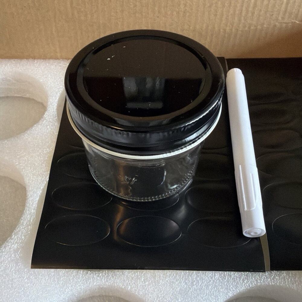 23 Clear 4 oz Round Glass Jars with Black Metal Lids, and label stickers